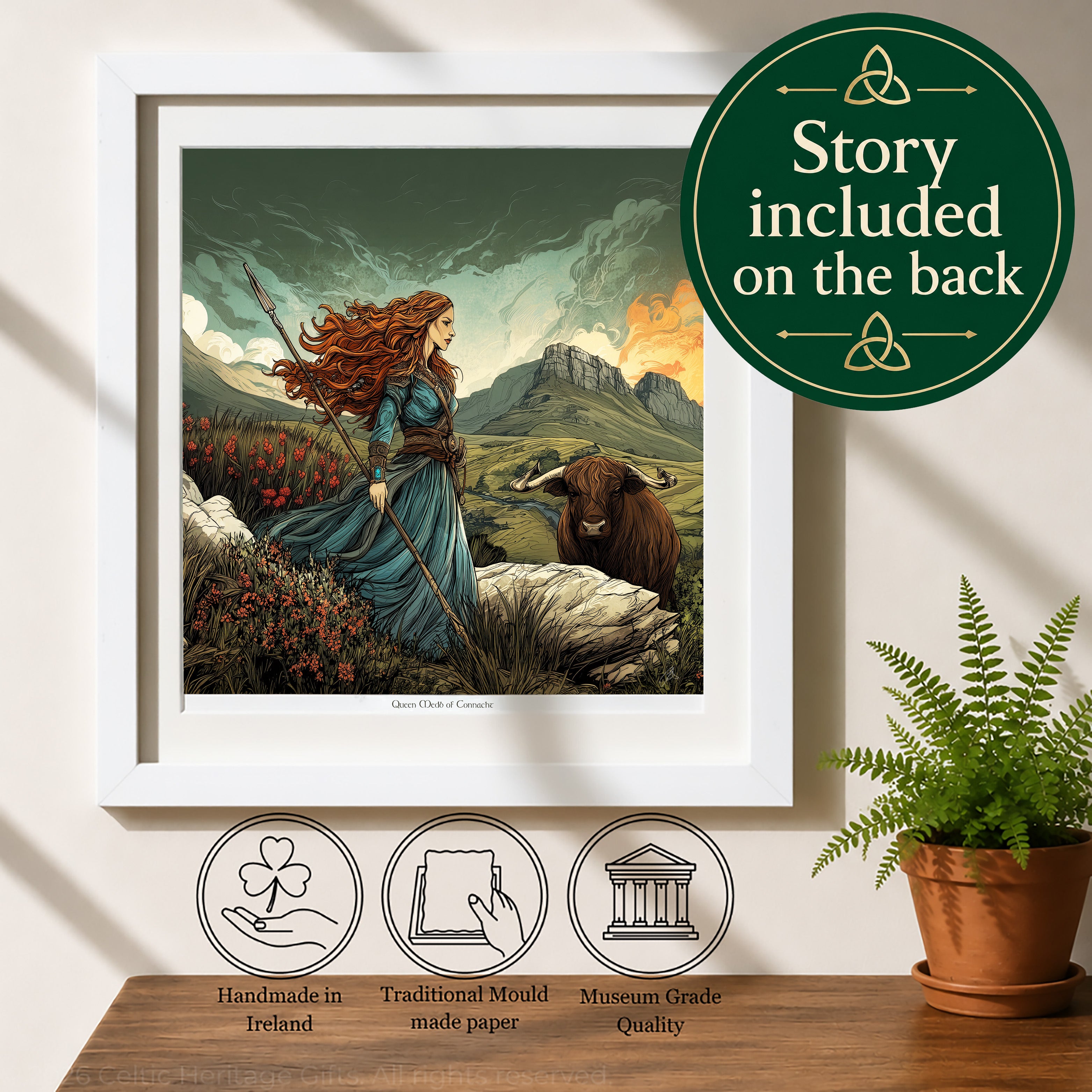 Framed art print featuring a traditional Irish scene with a woman in a blue dress holding a spear beside a brown cow, displayed on a wooden surface with a potted fern and a green badge that reads 'Story included on the back'.